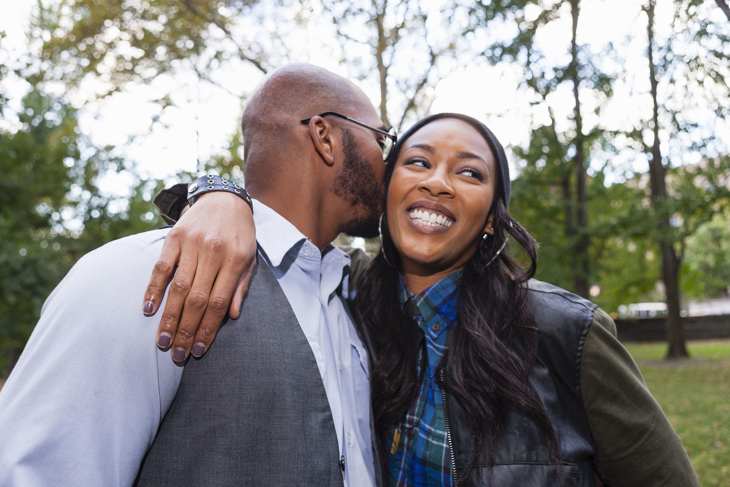 mankissingwomanscheekinpark20250404081317utc 1 Arcane Guides